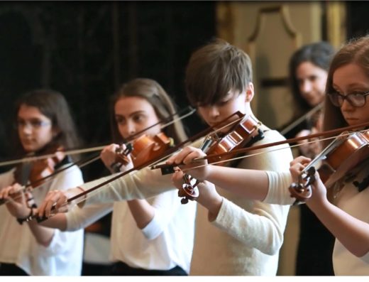 Four Young Violinists in performance